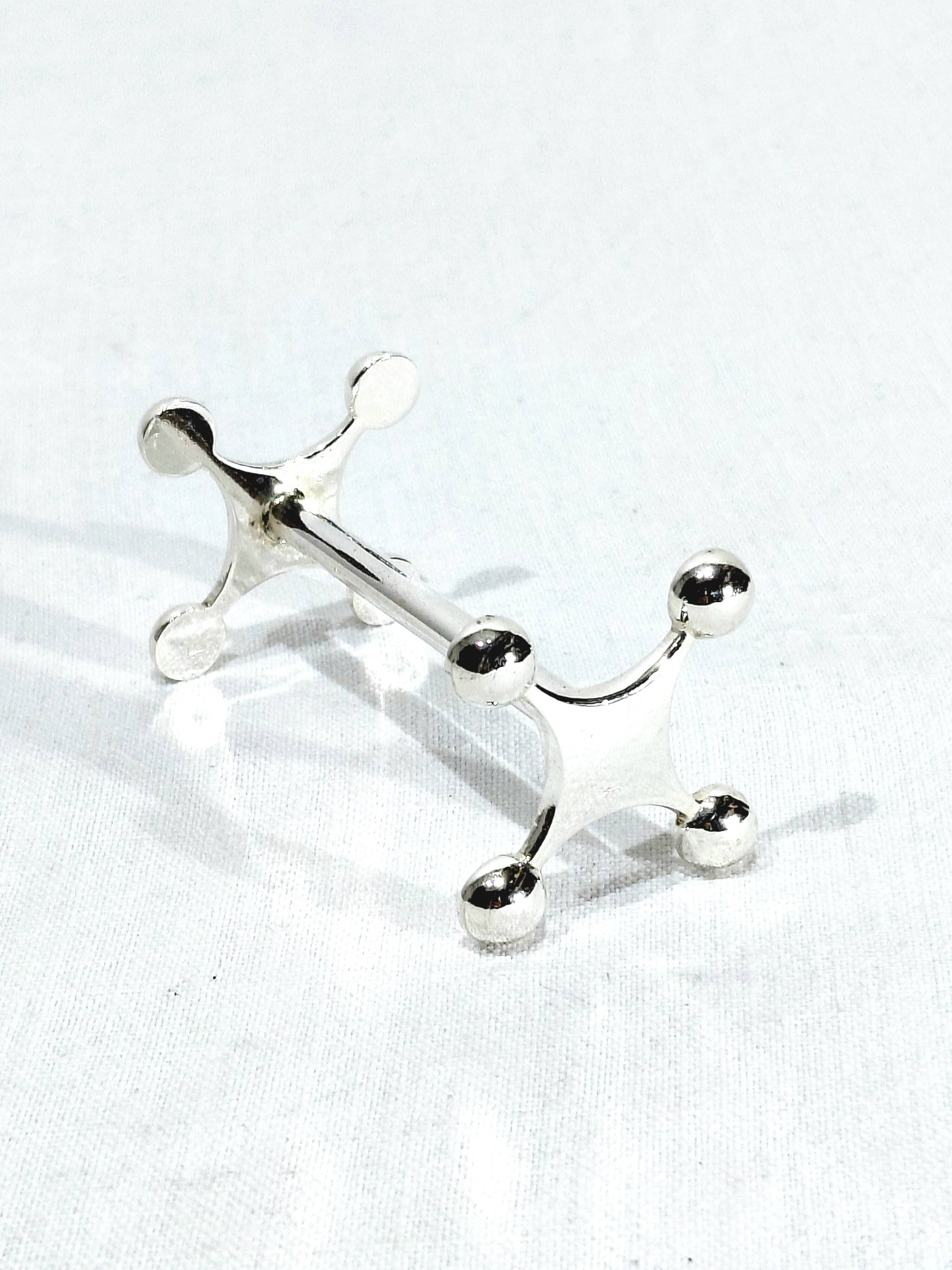 SET OF 12 SILVER-PLATED KNIFE RESTS