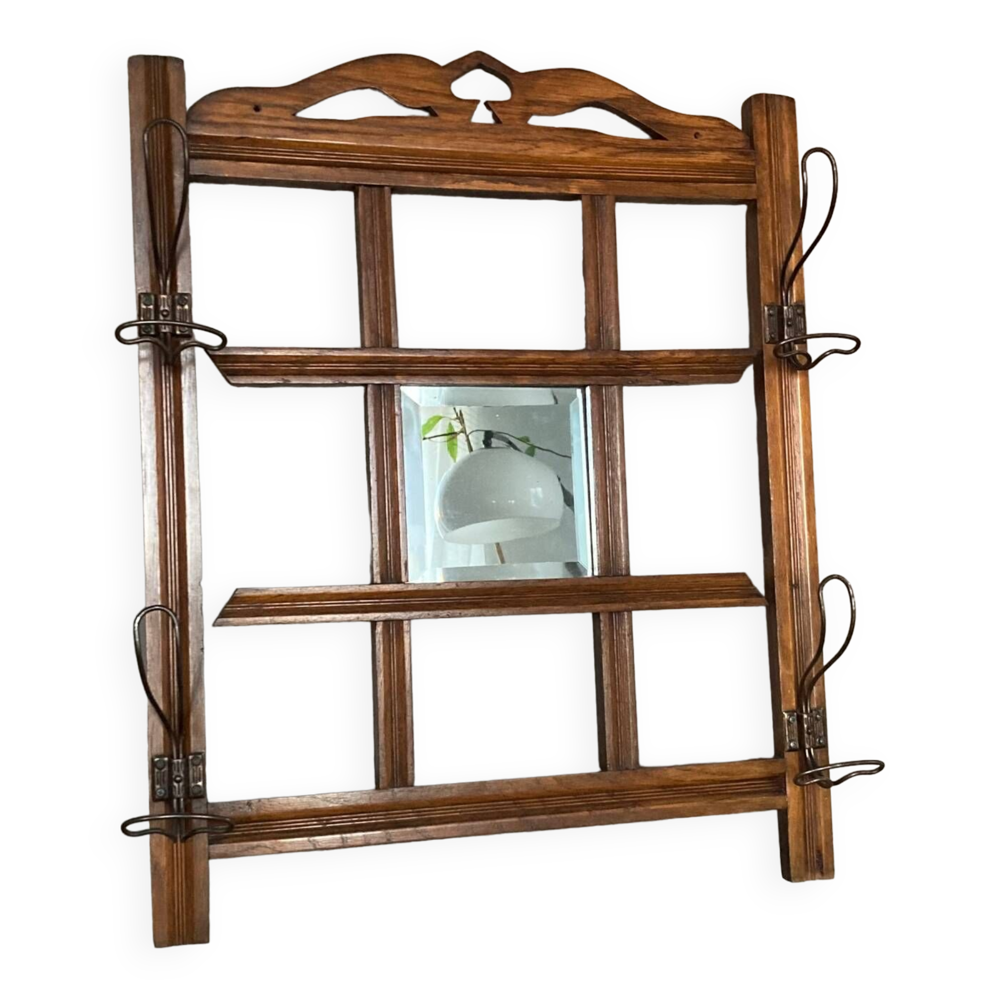 Art Deco wall-mounted coat rack in oak, early 20th century. Beveled central mirror
