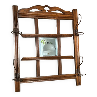 Art Deco wall-mounted coat rack in oak, early 20th century. Beveled central mirror