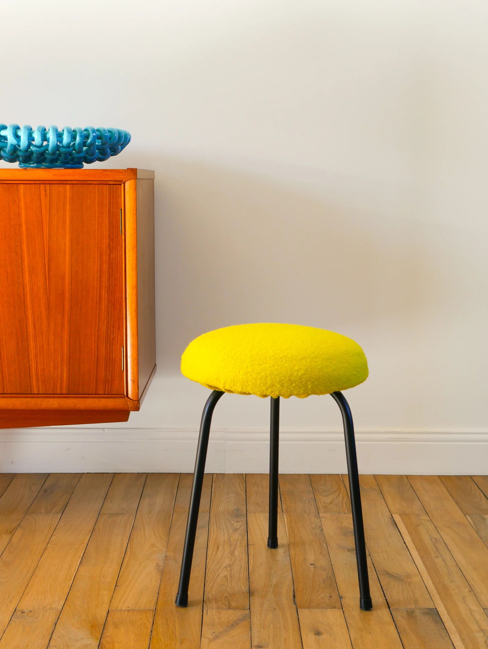 Black iron tripod stool with boiled wool, yellow, 1960.