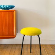 Black iron tripod stool with boiled wool, yellow, 1960.