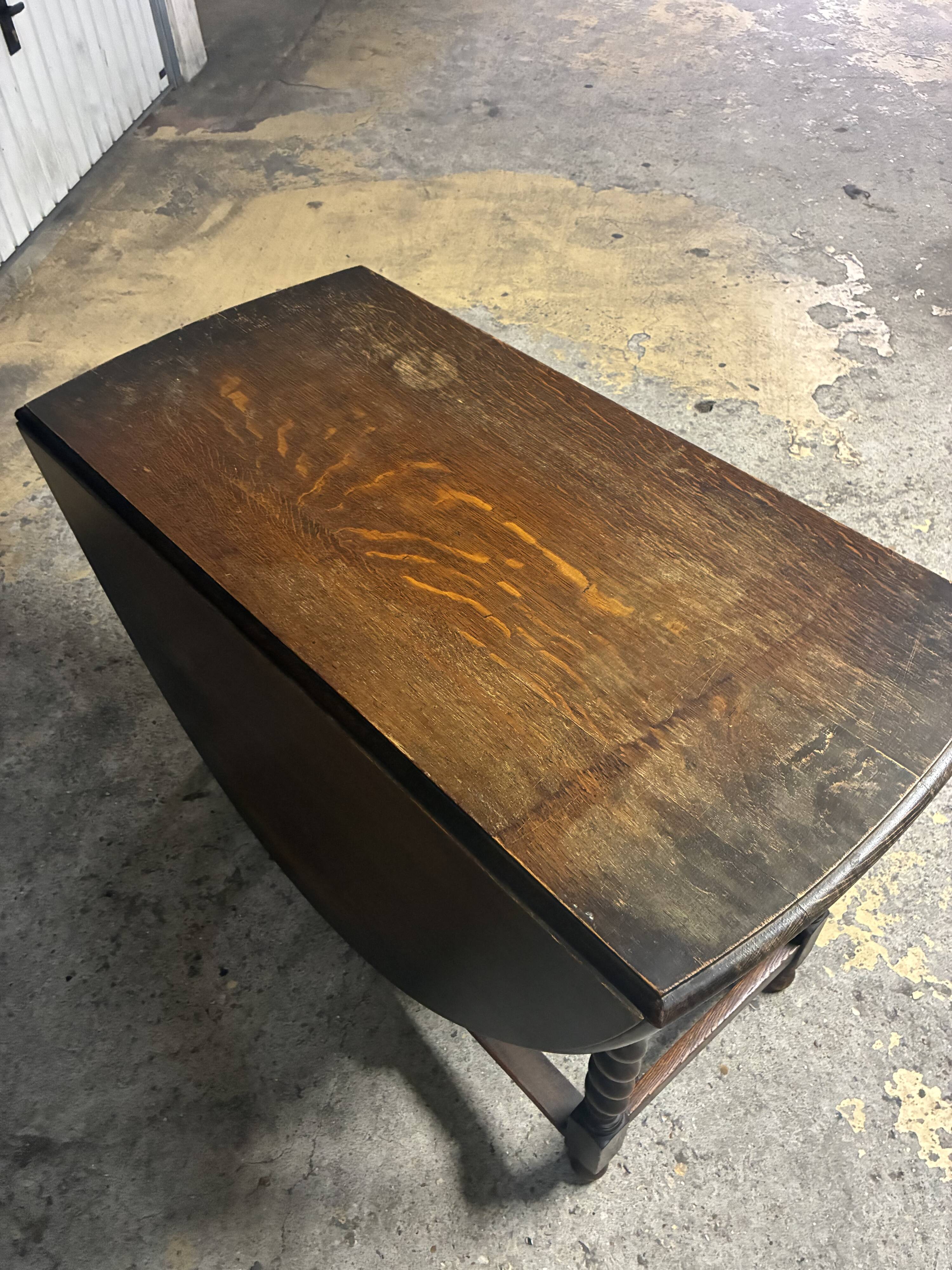 Folding wooden table with twisted legs