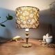 brass table lamp | khaki lampshade with multicoloured daisies