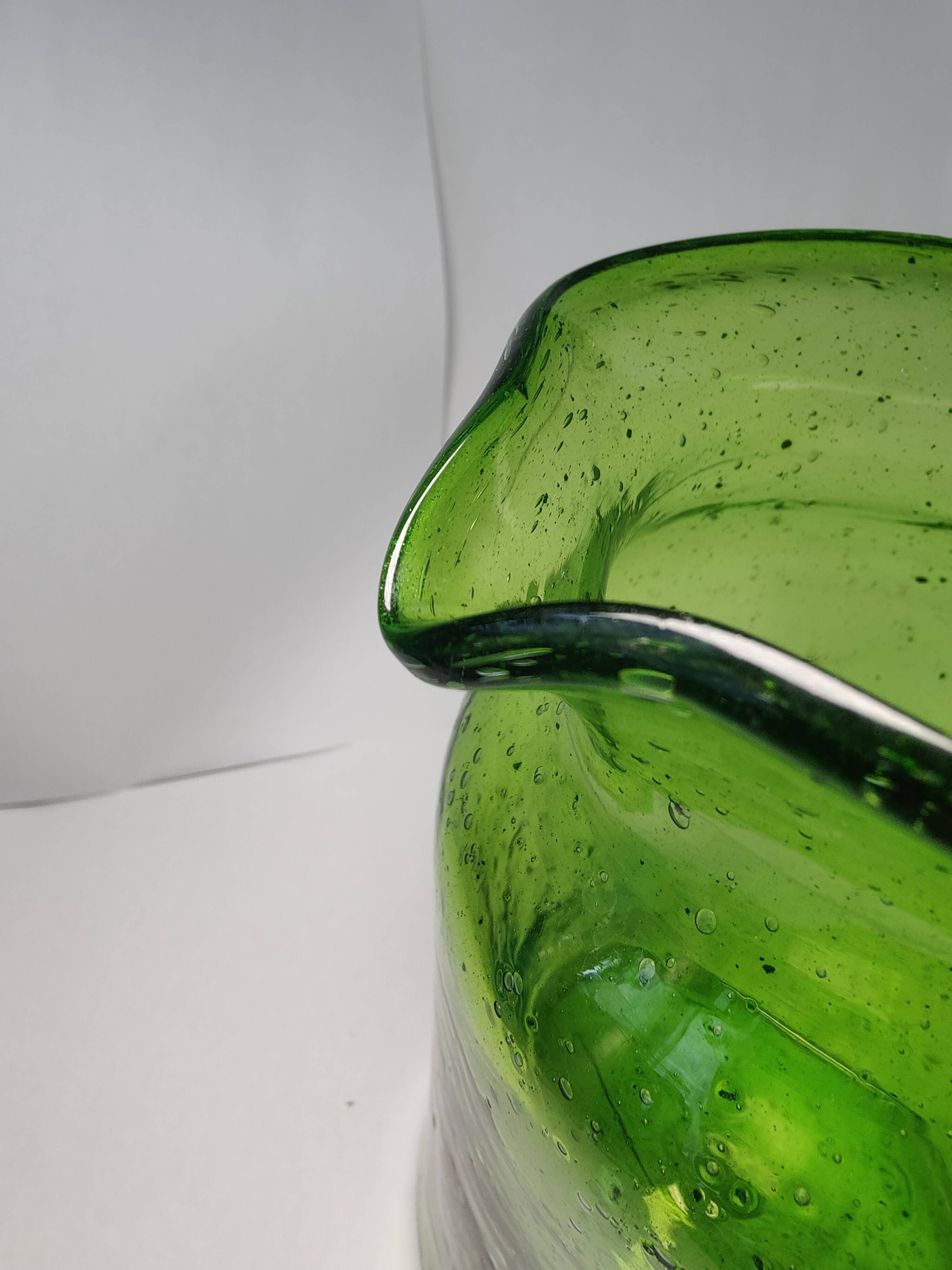 Bubble glass pitcher in the style of Biot or Empoli.