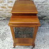 Bar cabinet on casters in walnut