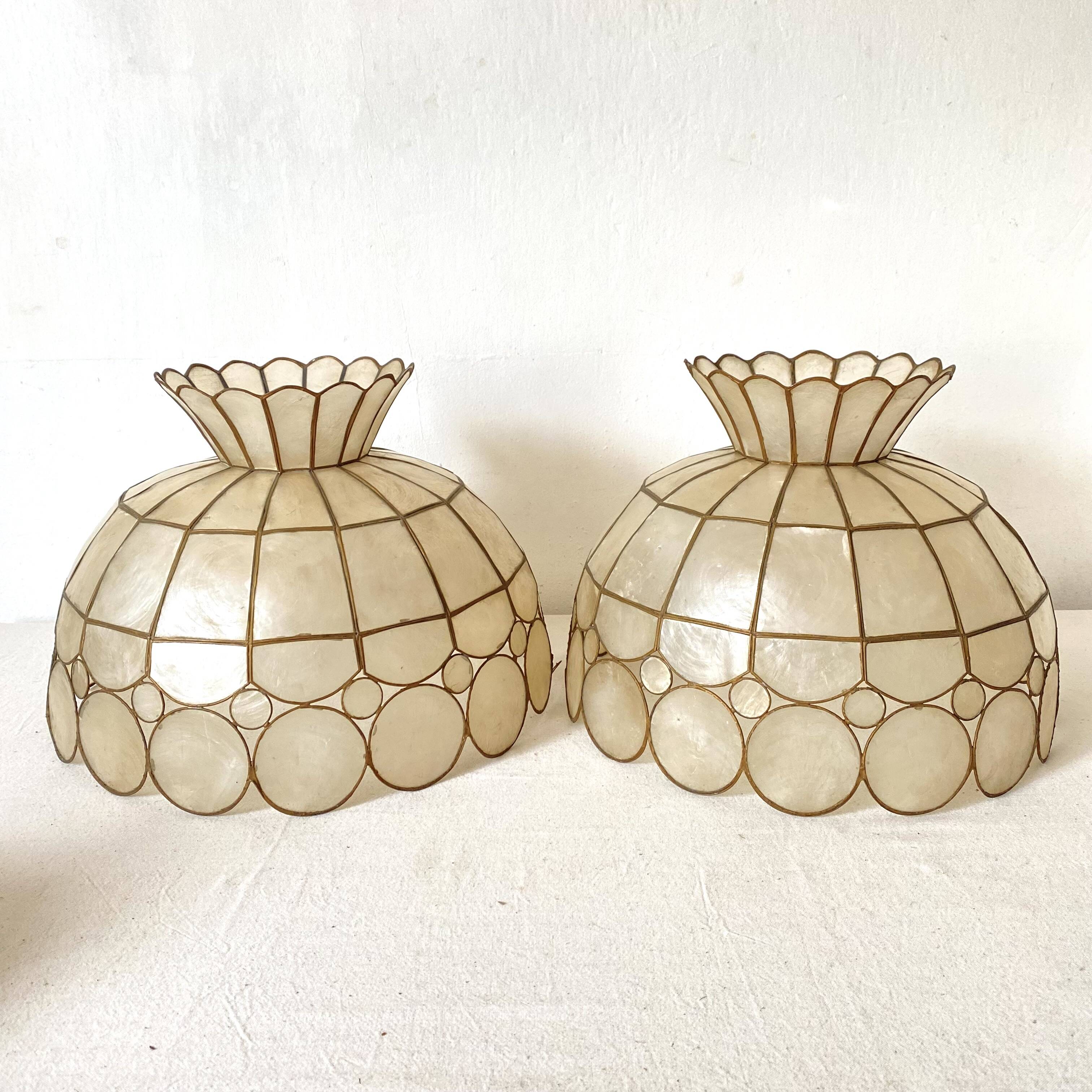 Pair of mother-of-pearl and brass pendants