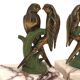 Art Deco pair of bookends with metal parrots and a marble base.