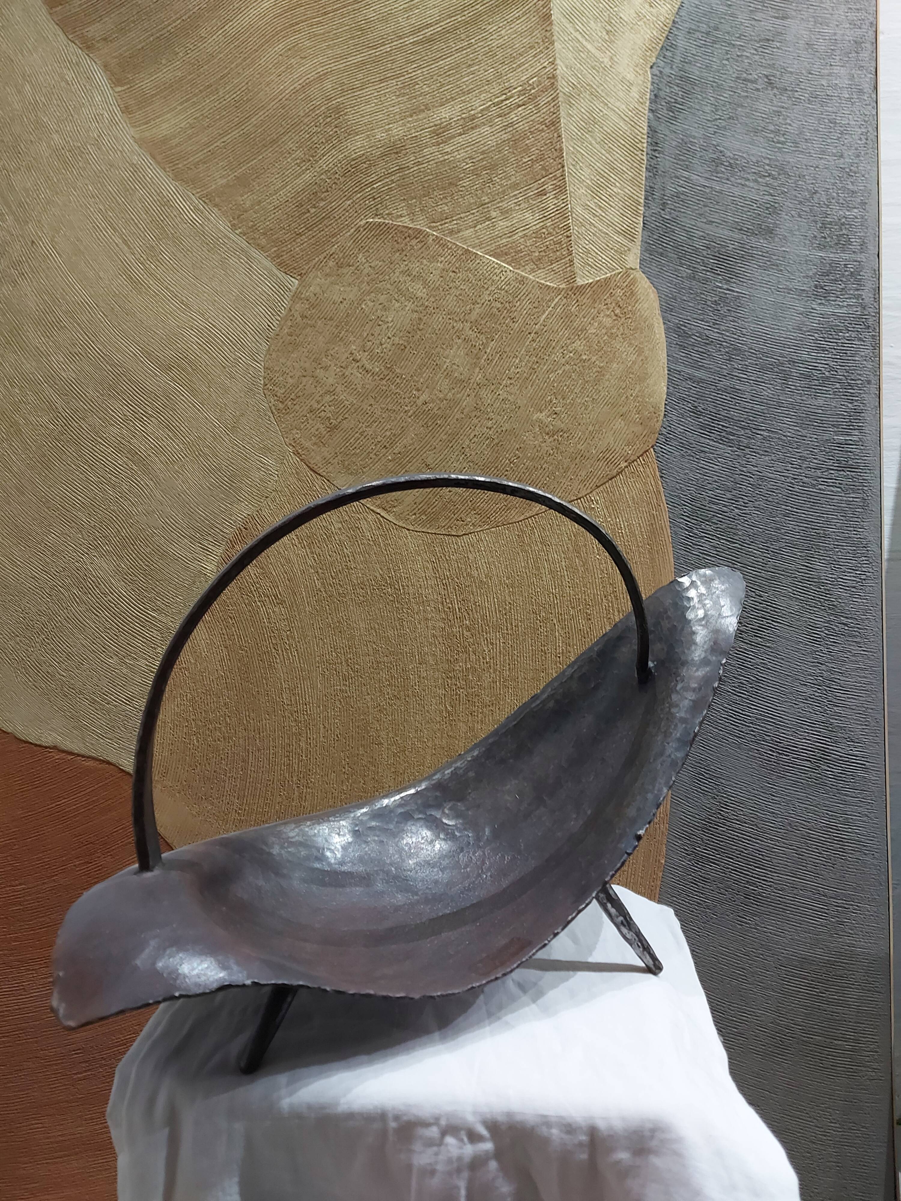 Sculptural cut in hammered iron year 50