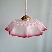 Pair of clear and pink satin glass scalloped pendant lights, 1920s-30s