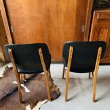 Pair of Scandinavian teak and skai chairs