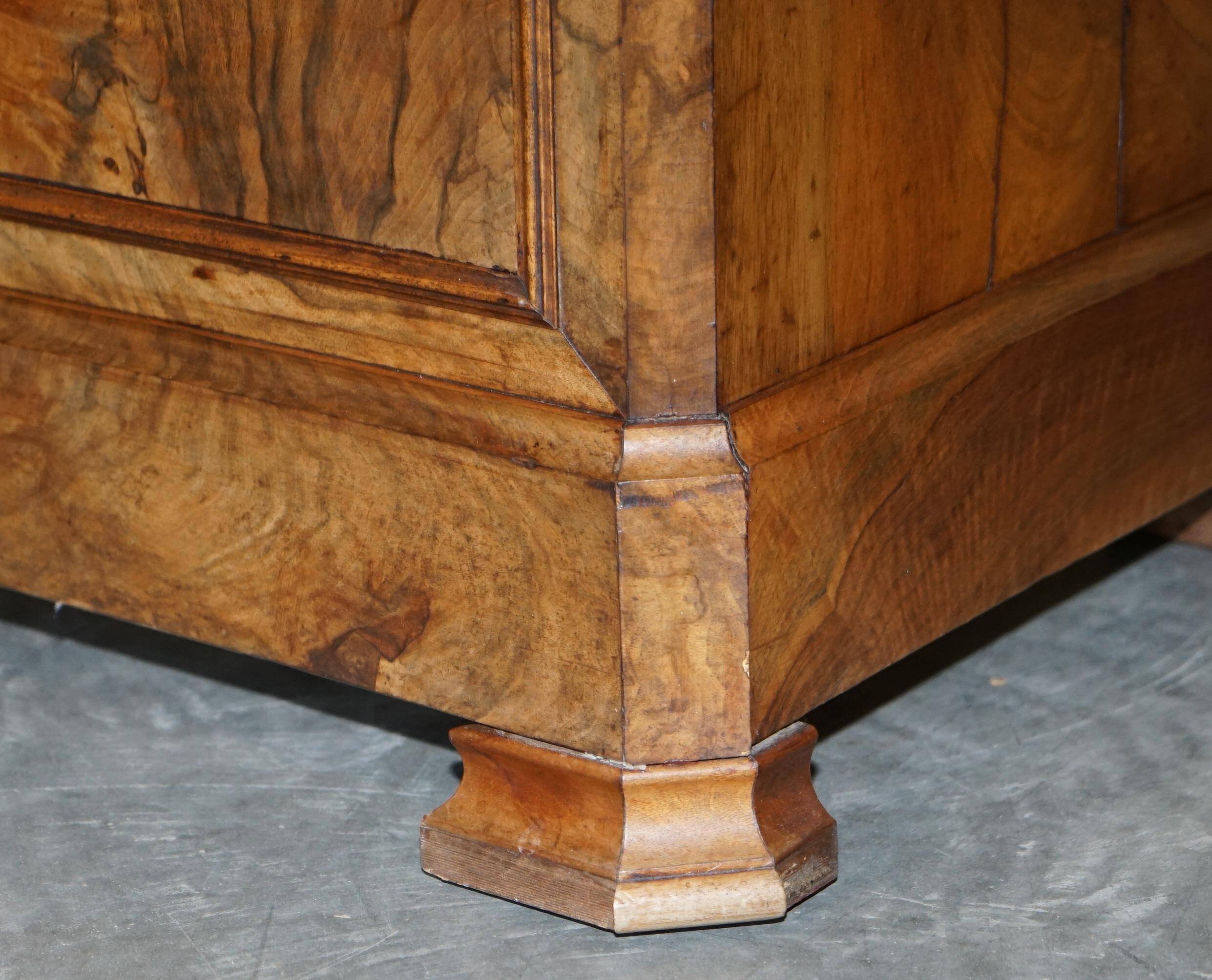 Antique walnut commode from 1860 with a marble top and original key.