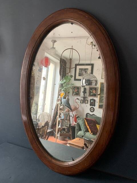 Large antique oval mahogany mirror, mercury glass, 19th century