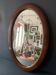 Large antique oval mahogany mirror, mercury glass, 19th century