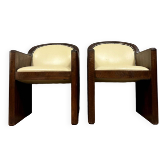 Pair of barrel armchairs in mahogany and synthetic leather circa 1930