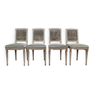Suite de 4 chaises cannées style Louis XVI Jean Mocque