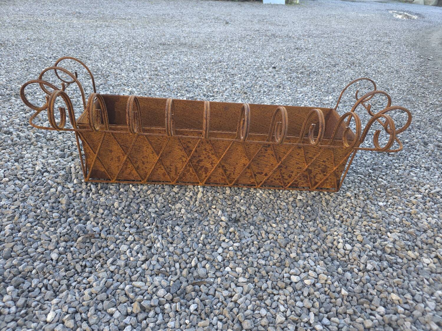 Wrought iron wall planter
