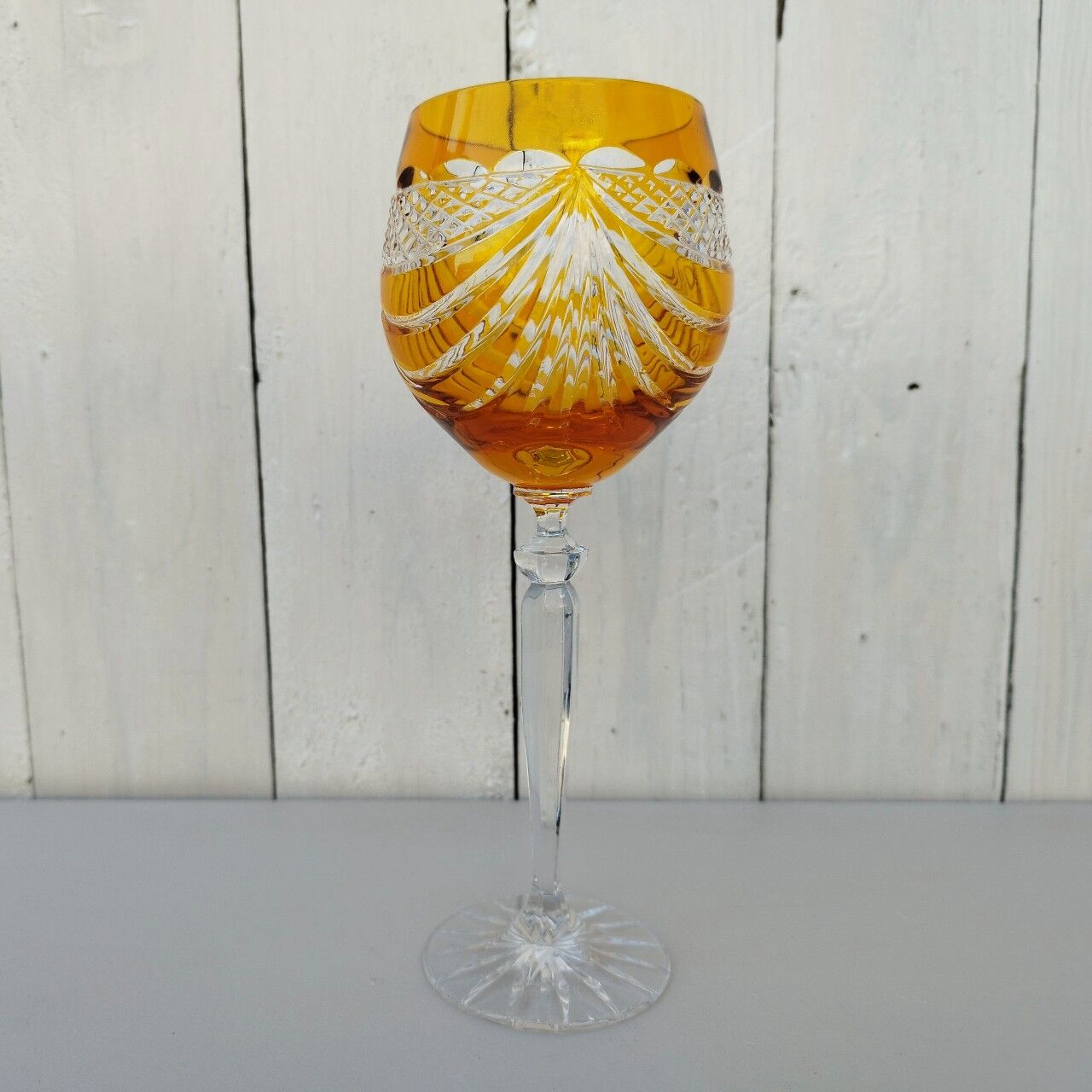 Six vintage coloured cut crystal wine glasses
