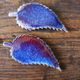 A set of 4 handcrafted pottery knife rests in blue.