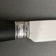 Suite de 23 couteaux kindal manche ebene ou bakelite XXe
