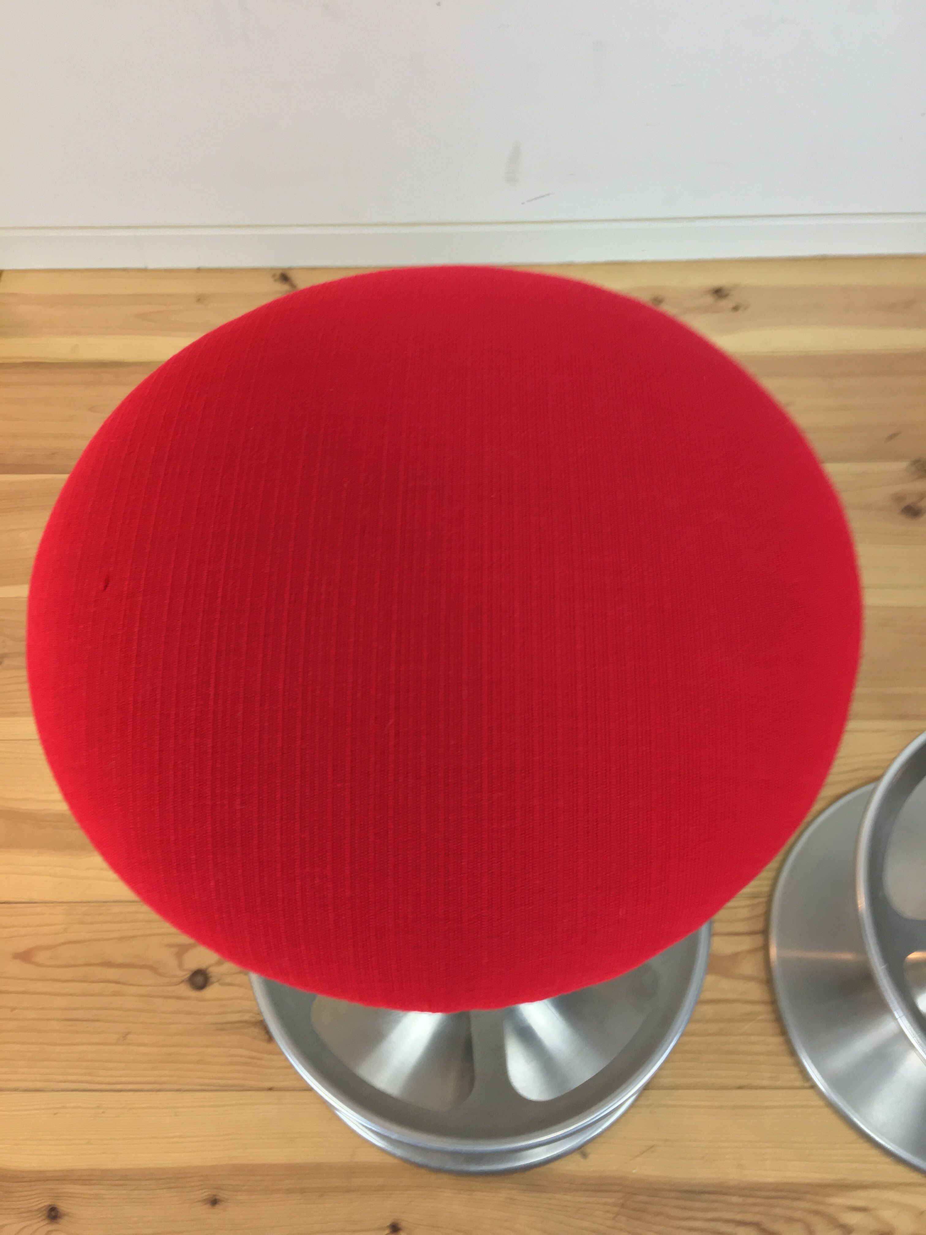 Pair of 70's style metal bar stools in pop red