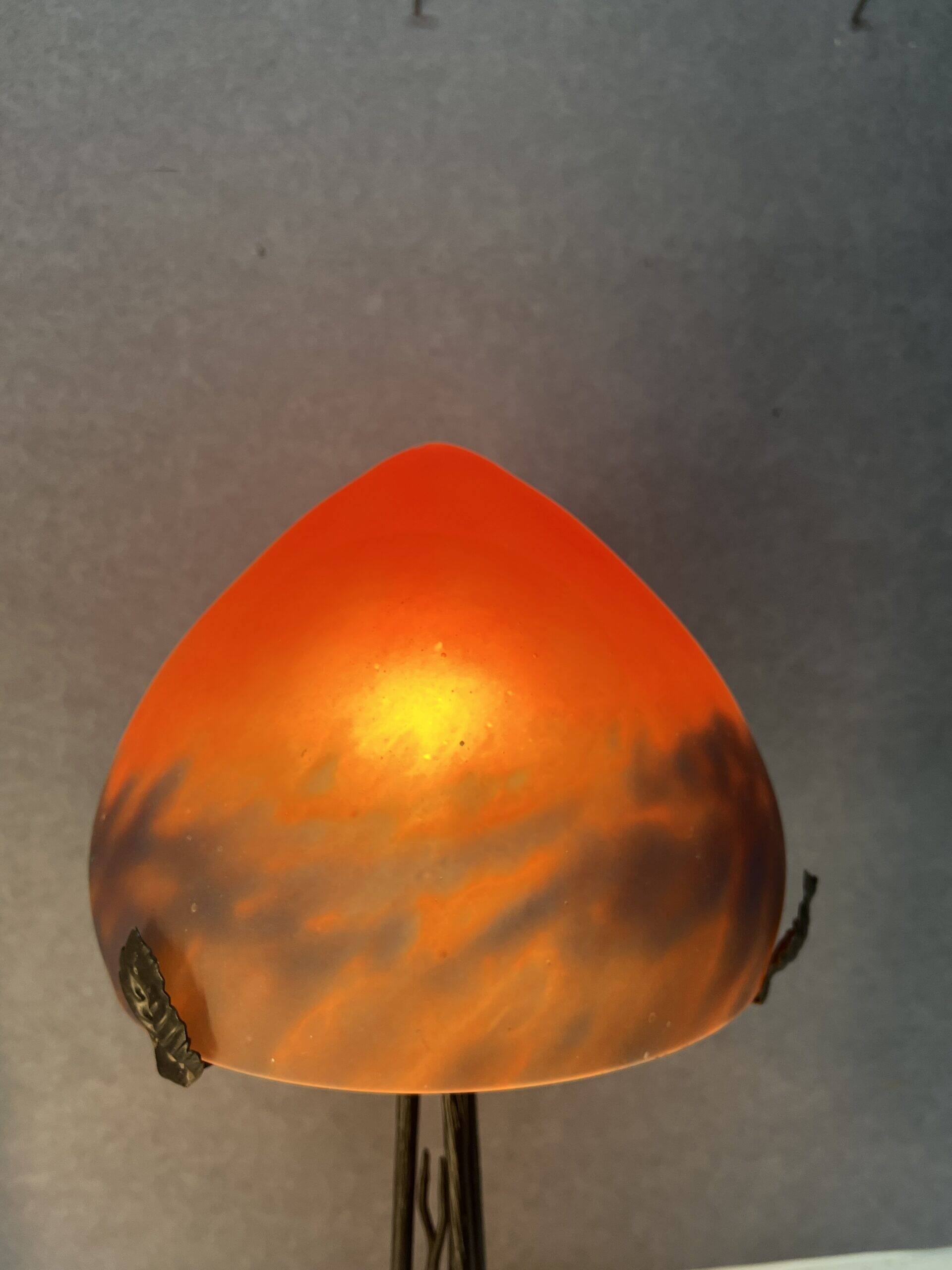 Contemporary mushroom lamp, wrought iron base and orange glass shell with blue hues in the art deco style