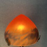Contemporary mushroom lamp, wrought iron base and orange glass shell with blue hues in the art deco style