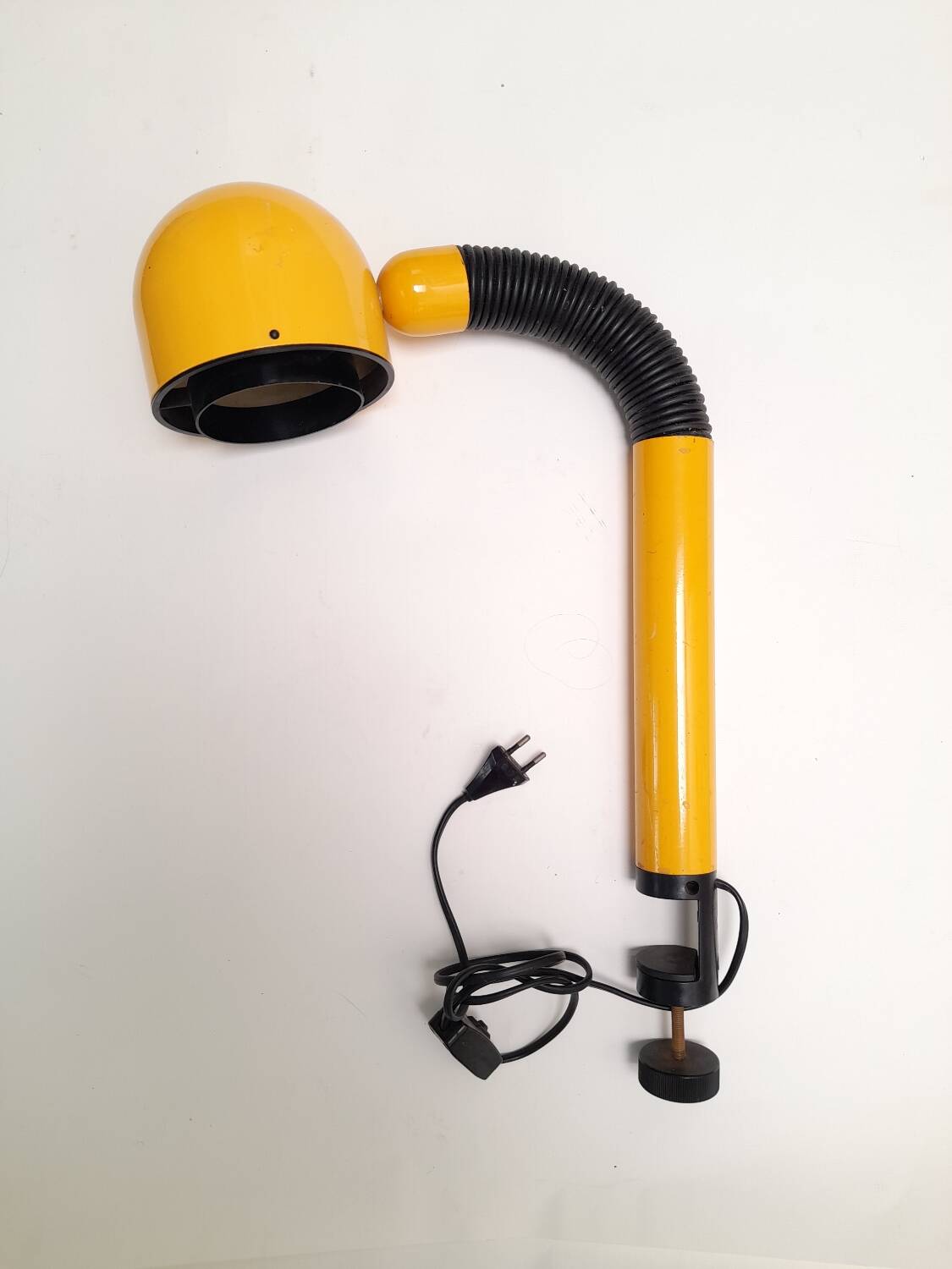Bright yellow tubular desk lamp from the 80s