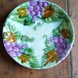 Old plate in slurry pattern grapes