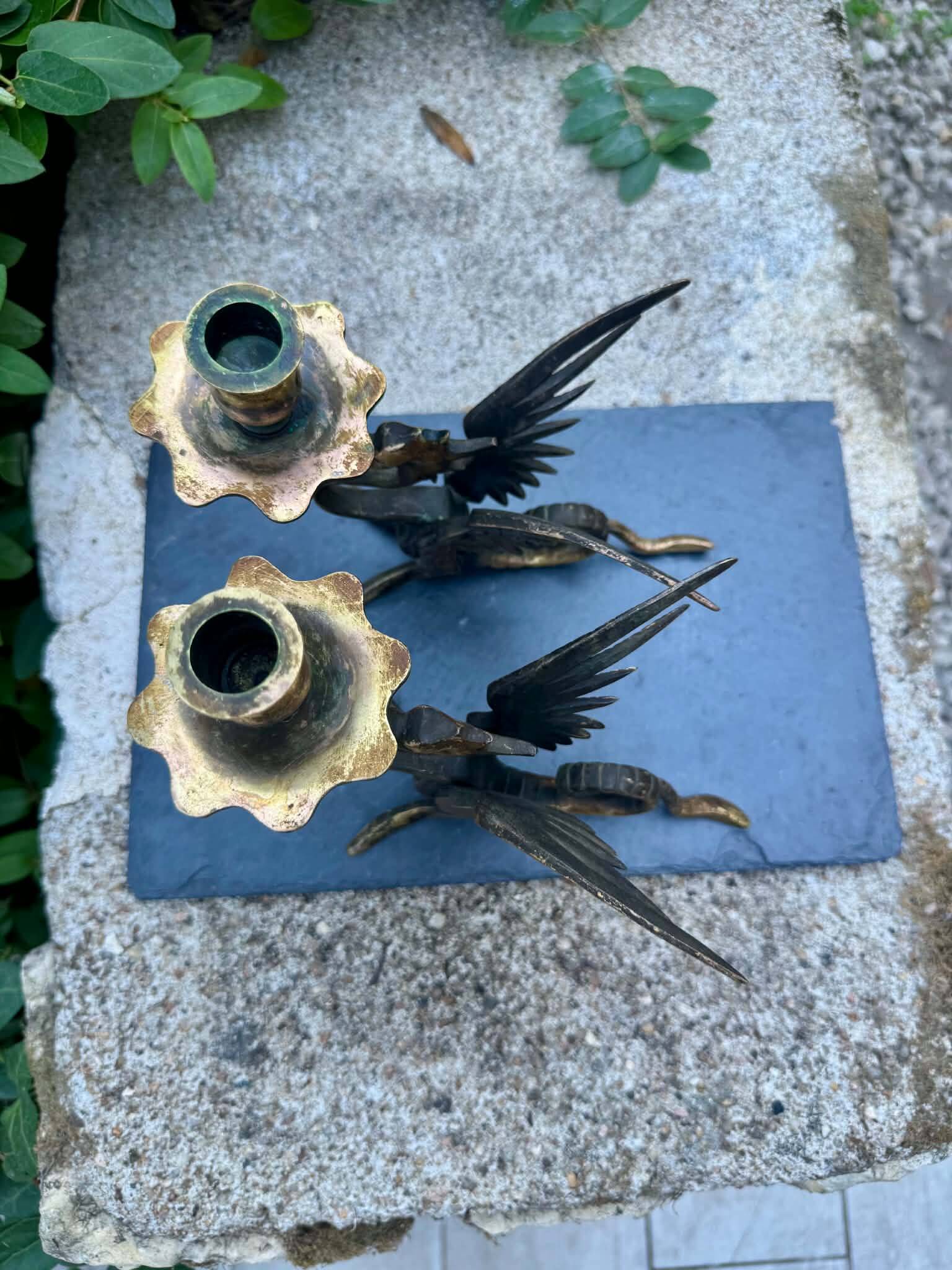 Pair of chimera candle holders in bronze, 19th century.