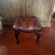 Red leather footrest in Chesterfield style, vintage 1970s.