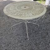 Old garden table in solid wrought iron