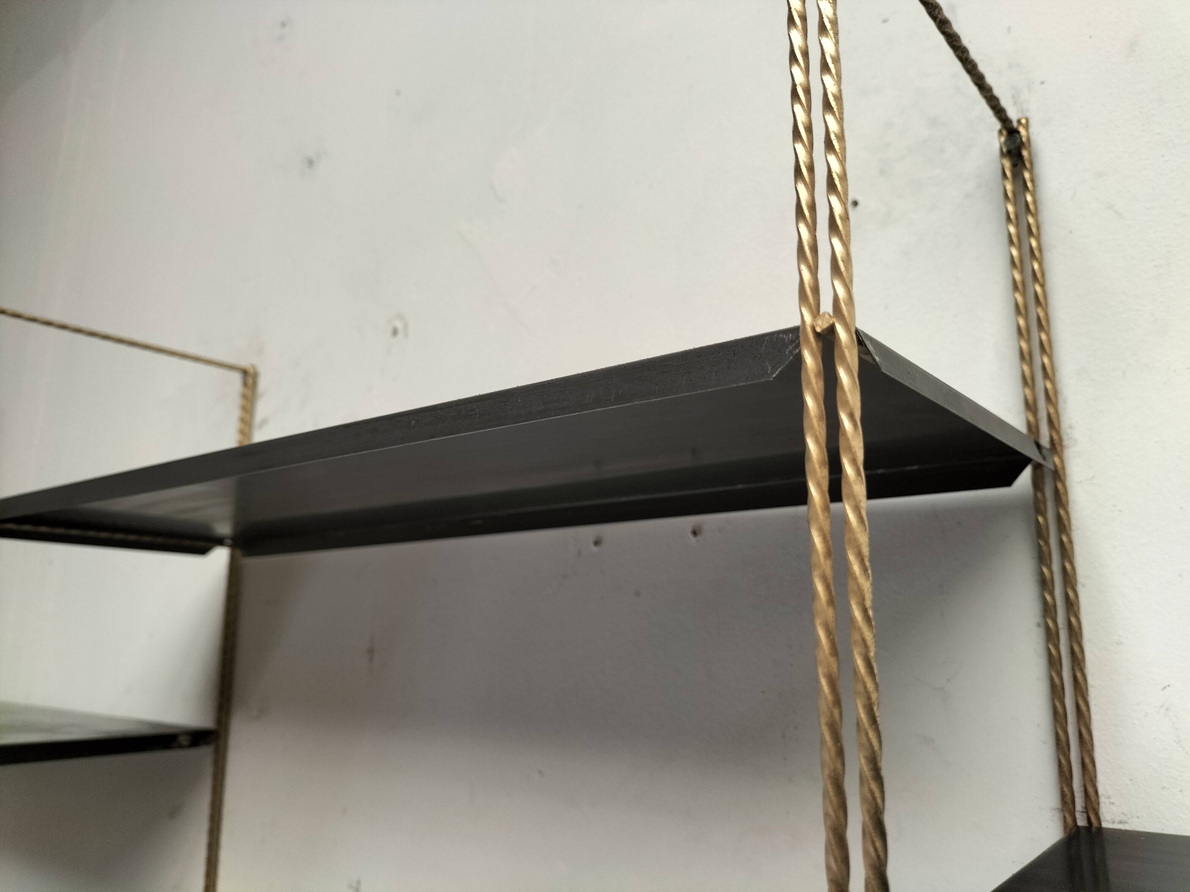Modular black metal shelf