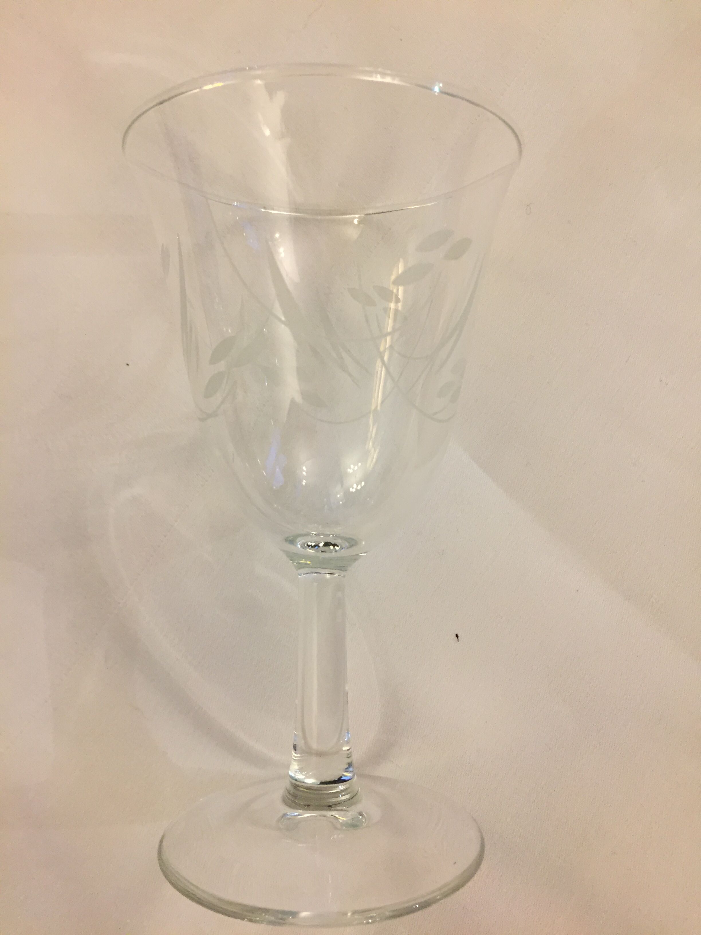 Set of six engraved wine glasses