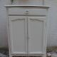 Small vintage buffet reimagined in pearl grey, wooden top.