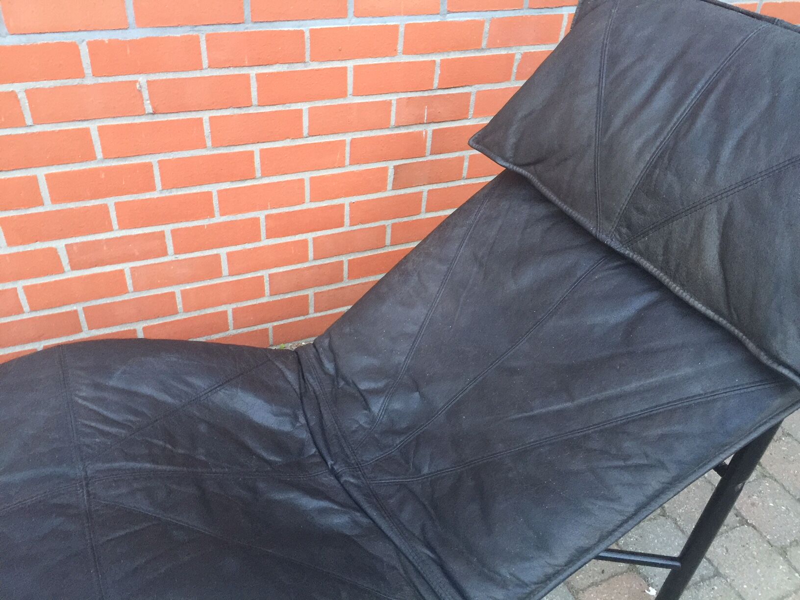 Leather lounge chair  by wrong Björklund  1980 s
