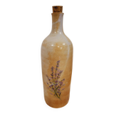 Bouteille fleurie en grès émaillé