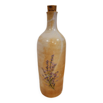 Bouteille fleurie en grès émaillé