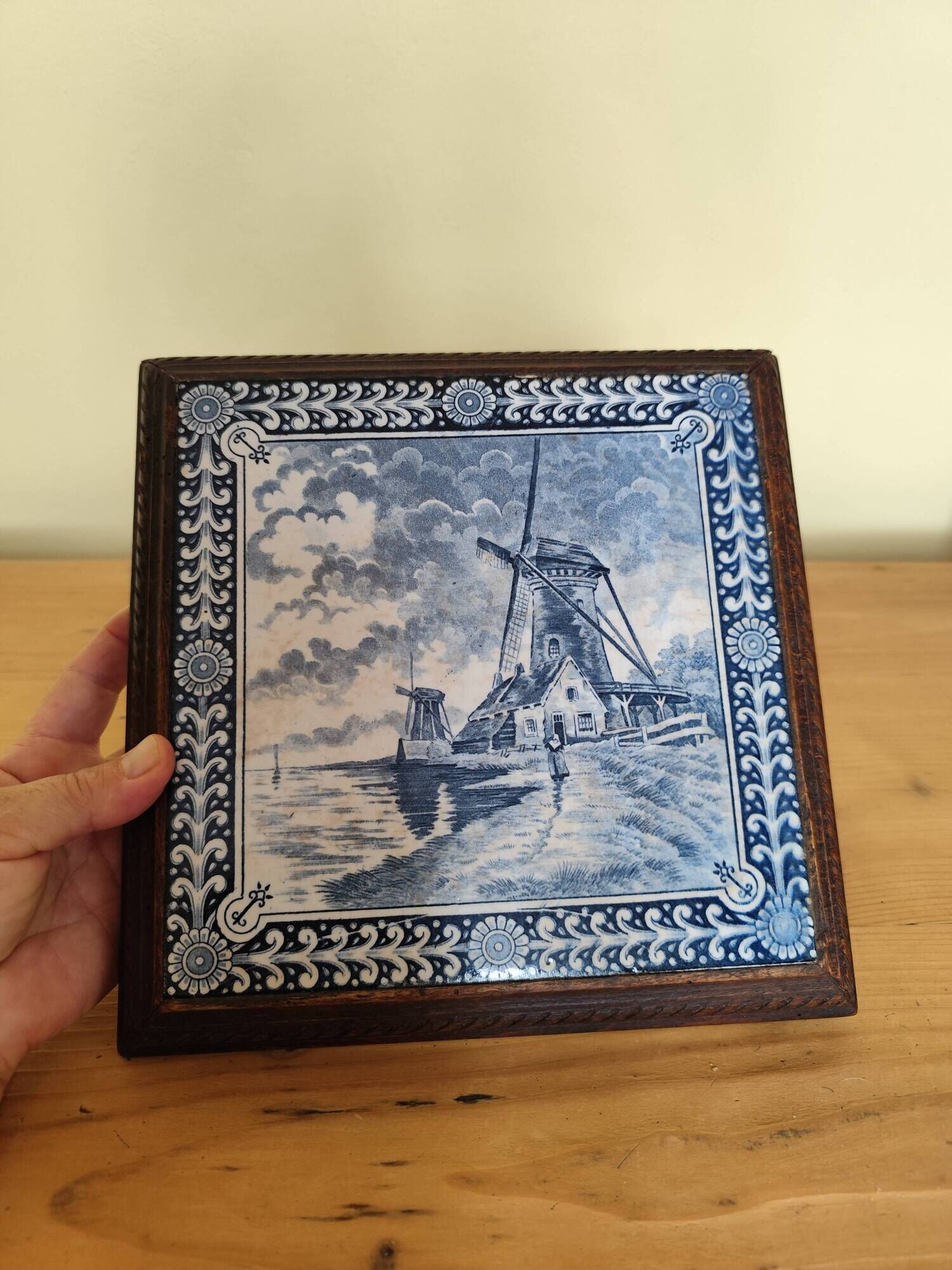 Ceramic tile trivet and wooden frame with Dutch windmill.