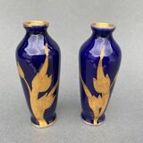 Pair of 1900 Limoges vases with blue background and gold highlights, R. Rosier decorations