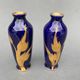 Pair of 1900 Limoges vases with blue background and gold highlights, R. Rosier decorations