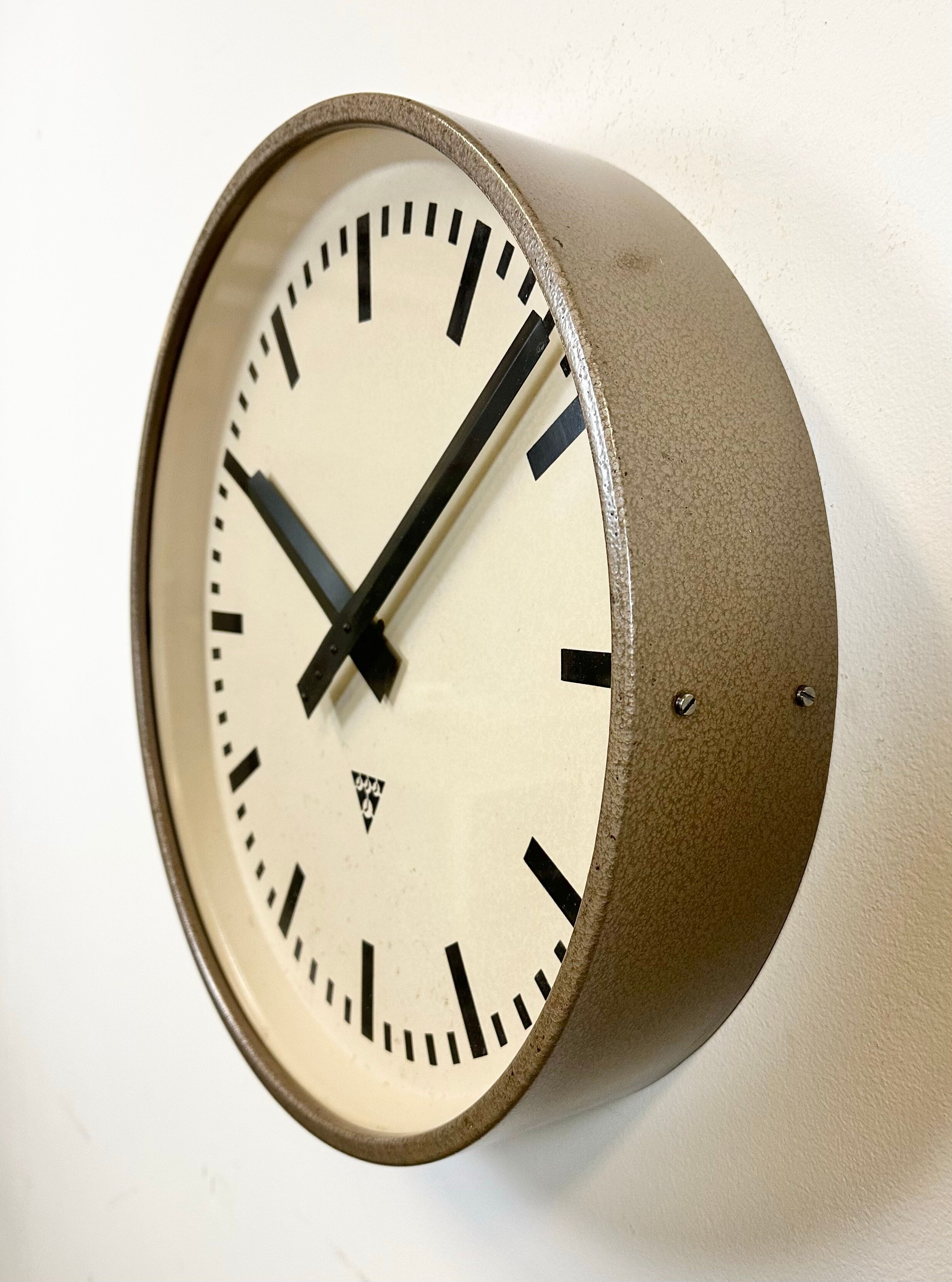 Brown industrial factory wall clock from Pragotron, 1960s