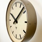 Brown industrial factory wall clock from Pragotron, 1960s