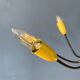 Vintage yellow spider suspension from the 1950s.