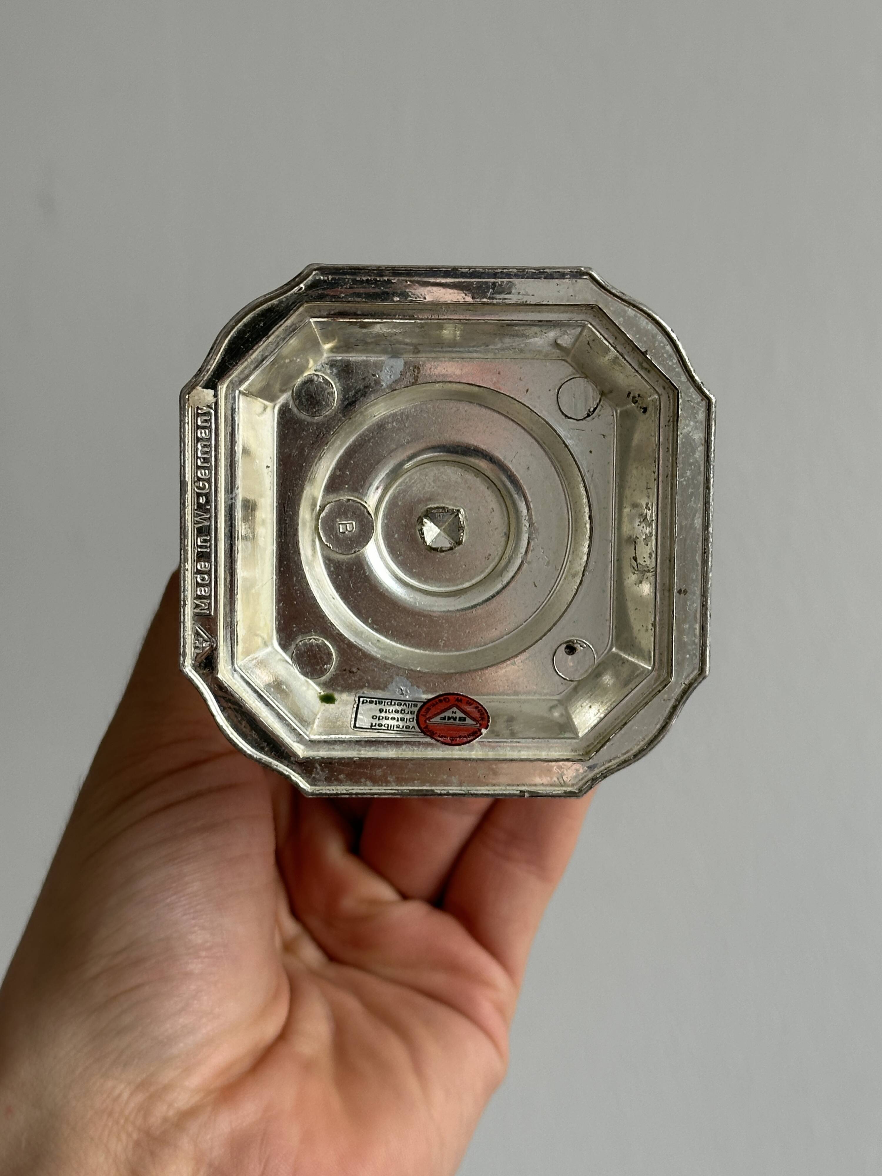 Small antique metal candle holder