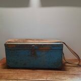 Old wooden trunk with blue patina