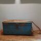 Antique wooden trunk with blue patina