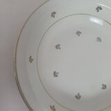 Set of 2 white deep plates with a gold pattern.