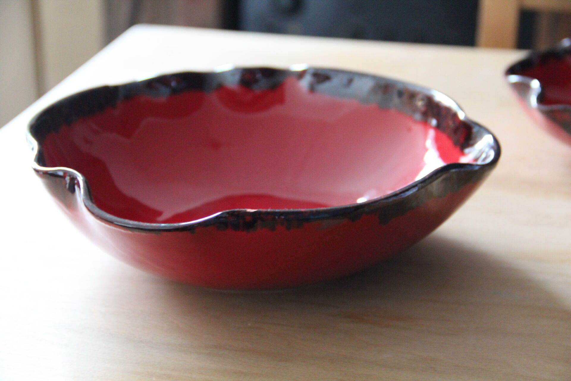 2 red glazed terracotta dishes
