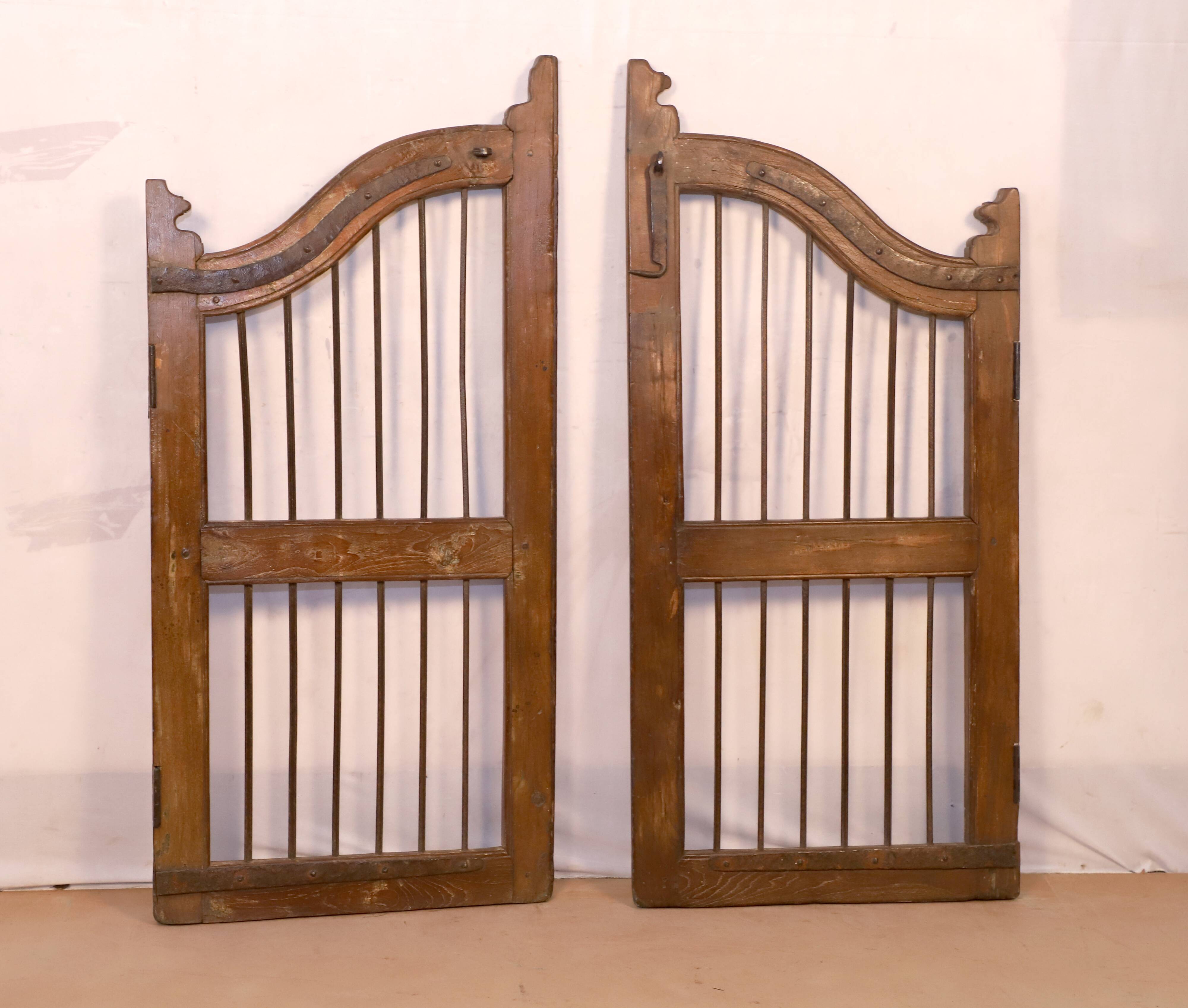 Old Burmese teak gate with openwork wrought iron panels