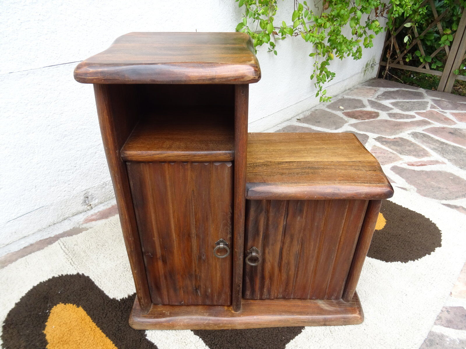 Asymmetrical brutalist furniture in solid elm